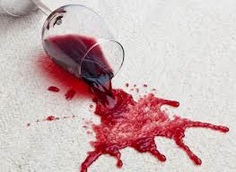 red wine spilt on white carpet use all-natural carpet stain remover